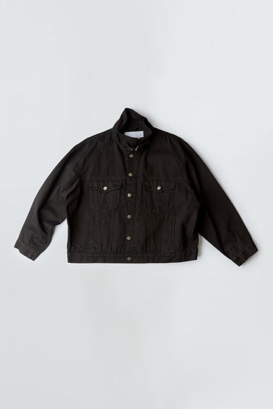 Oracle Denim Jacket in black by Deadwood, oversized black denim with steel buttons and uniform-inspired details.