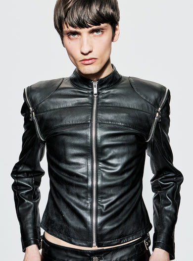 Front view of Dita Jacket by Deadwood on male model, showcasing structured leather silhouette, front zipper, and full-length sleeves