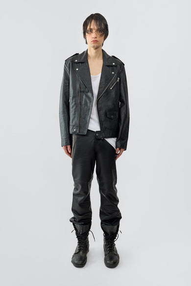 Model wearing the River black biker jacket made from upcycled lambskin.