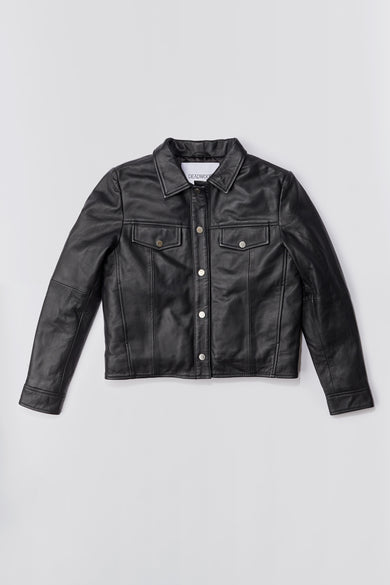 Frankie black leather trucker jacket by Deadwood, featuring button closure, chest flap pockets, and adjustable back straps, made from upcycled leather.