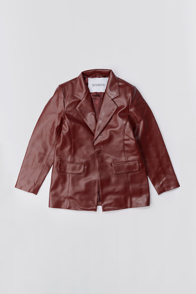 Red Deadwood single-button blazer with a 90's feel to it. It features rounded flap pockets, an inside pocket and has a regular fit. Made from plant-based (vegan) Cactus leather. 