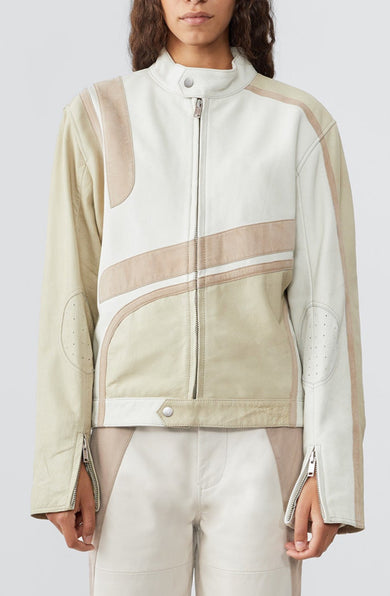 Model in Hiro off-white leather jacket by Deadwood, inspired by 1980s Japanese street racing culture.