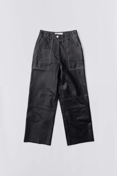 Presley Pants in black with white seams by Deadwood, wide-cut recycled leather with workwear details.