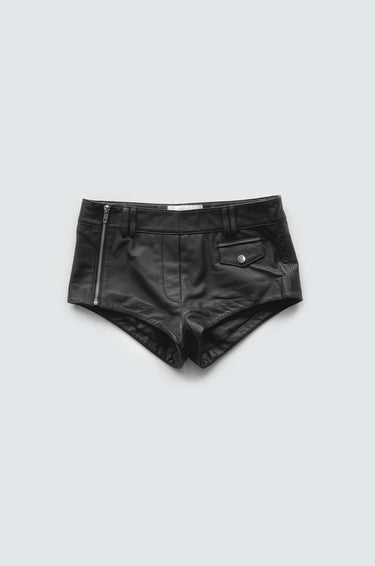 
The Hotz Shorts by Deadwood offer a bold, modern design in black upcycled leather. Featuring a side-placed zipper at the hip, a coin pocket with push-button closure, and tandem belt loops for a unique, functional style.