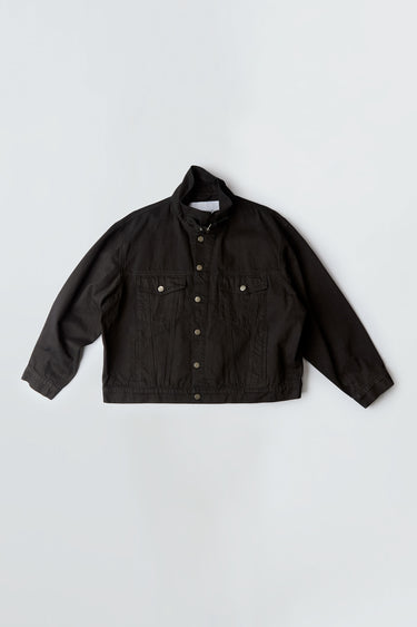 Oracle Denim Jacket in black by Deadwood, oversized black denim with steel buttons and uniform-inspired details.