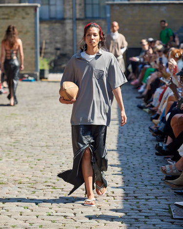 Female model on runway wearing black leather skirt from Deadwood Spring/Summer 2025 Collection during Copenhagen Fashion Week
