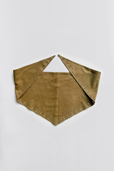 Flat of a multi-functional scarf top made from army green upcycled suede. Finished with eyelet detailing for adjustable styling. A statement in sustainability.