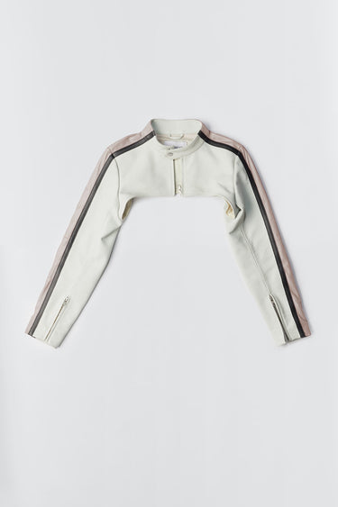 Flat view of the Sephir Top, an ultra-cropped leather jacket blending racer-inspired aesthetics with sustainable craftsmanship. Features a semi-hidden zipper at the center front and a button closure at the collar. Made from upcycled leather and suede, with a lining made from recycled PET bottles.