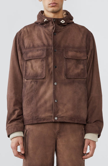 Person wearing a brown jacket and pants on a white background