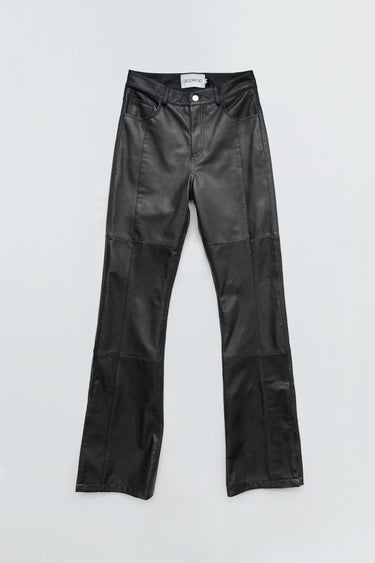 
The Prance Leather Pants in black feature a slight bootcut with leg slits, crafted from soft upcycled lambskin. A modern, sustainable design with timeless appeal.