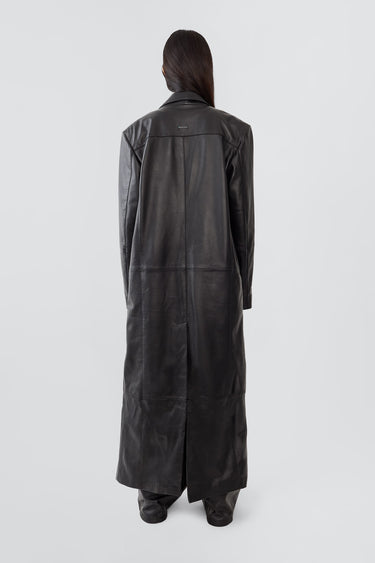 Back view of Vargen long leather coat by Deadwood, oversized fit crafted from sustainable upcycled lambskin.
