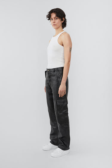 Model wearing straight cut cargo Deadwood pants with slightly dropped crotch, zip fly and workwear-inspired double waist pockets and leg pockets. One 32” length fits all.