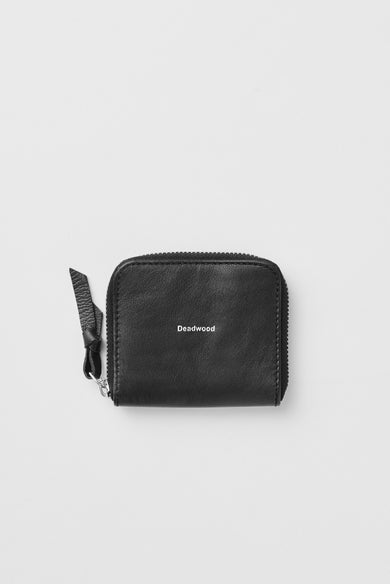 Black wallet in recycled leather with multiple separated compartments. Zipper closure and features the Deadwood logo in front.