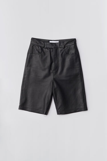 Deadwood black knee-length board shorts. Hook and zipper closure and right back pocket. Made from recycled leather.