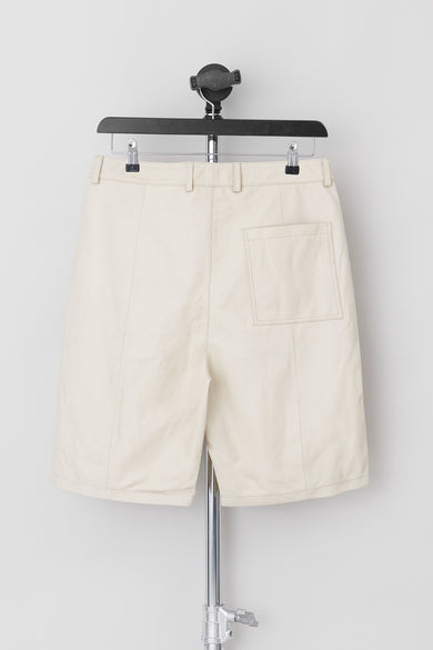 Deadwood knee-length board shorts in off-white. Hook and zipper closure and right back pocket. Made from recycled leather.