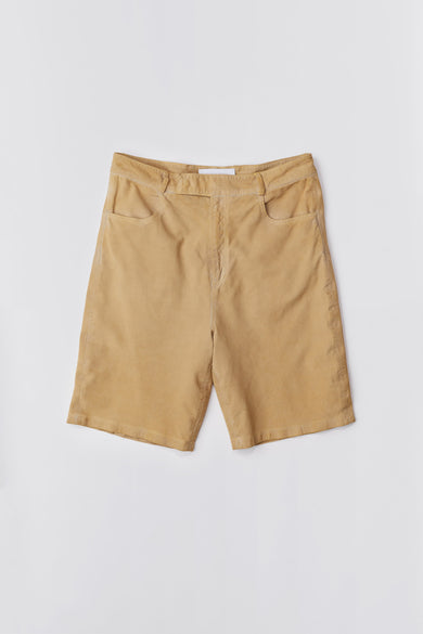 Deadwood knee-length suede board shorts in the color mimosa. Hook and zipper closure and right back pocket. Made from recycled suede.