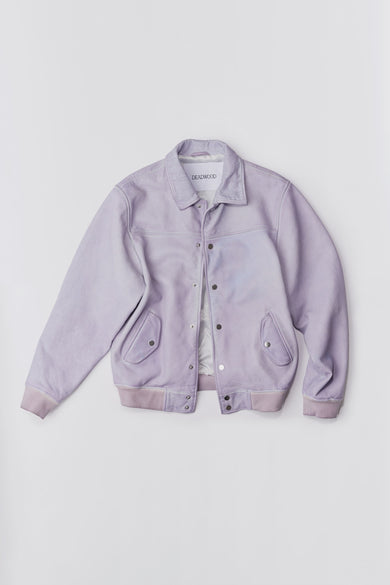 Varsity-inspired Deadwood jacket with cotton rib at cuffs and bottom hem, tilted front flap pockets and push buttons at center-front. In color lavender. Made from recycled cow leather.