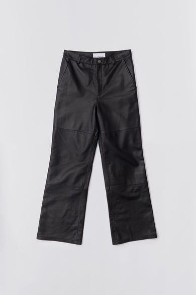 Black Deadwood leather pants with a casual straight to semi wide fit. Made from recycled leather.
