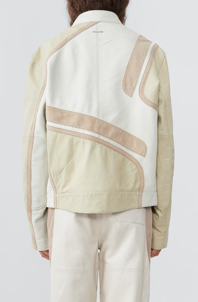 Model from the back in Hiro off-white leather jacket by Deadwood, inspired by 1980s Japanese street racing culture.
